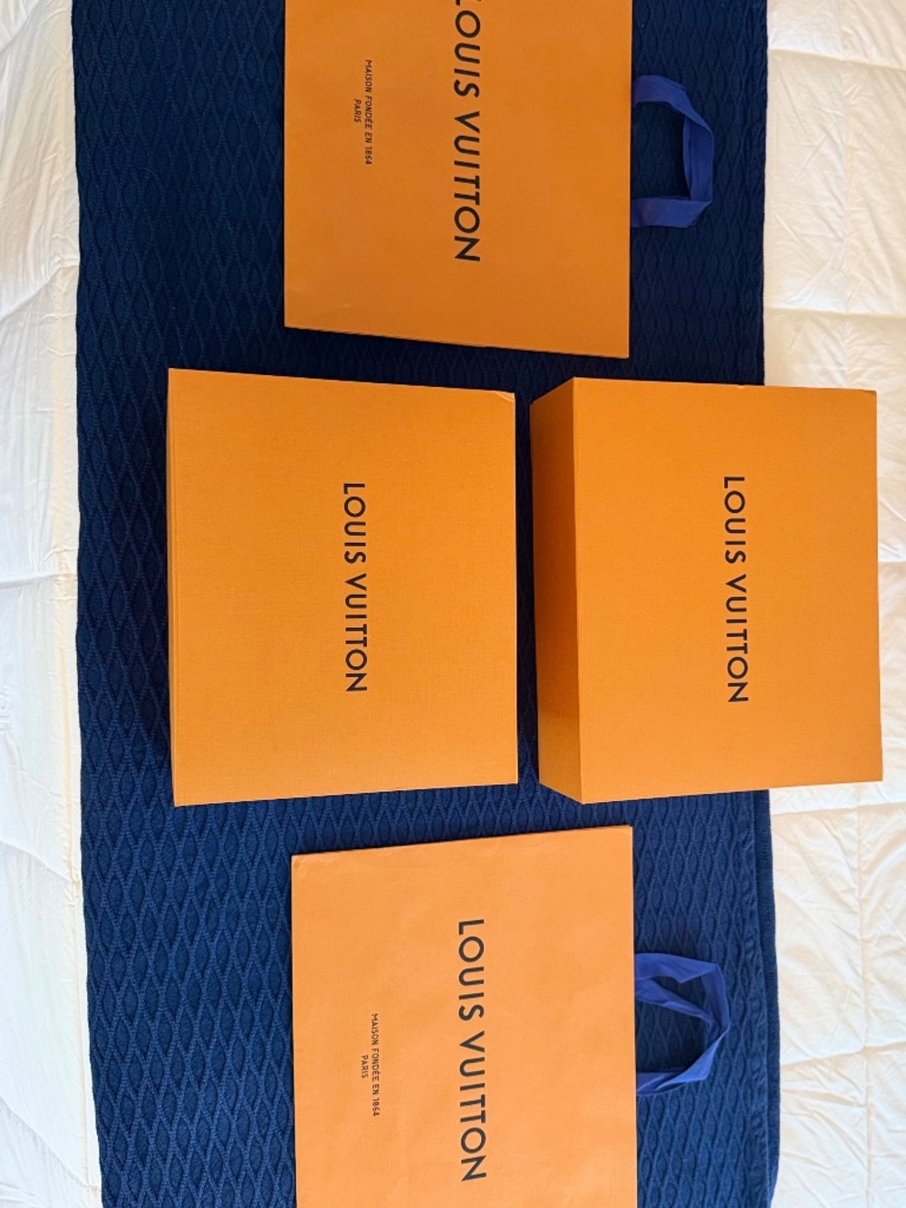 Louis Vuitton boxes and bags